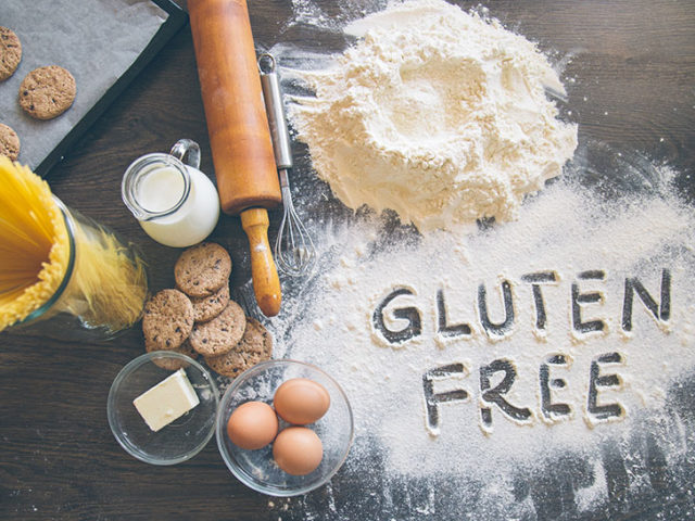 Baking background with “Gluten free” writting in flour