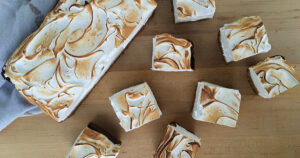 Toasty meringue waves on lemon bars—crispy, creamy, and ready to disappear.